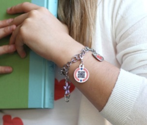 One size fits all, set of 5 movable charms on lobster clasps. http://dynotag.hostedbywebstore.com/Dynotag®-Enabled-Emergency-Information-Bracelet/dp/B00P3BMY1Y